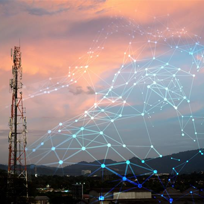 A telecom tower in an evening background with tech nodes emerging