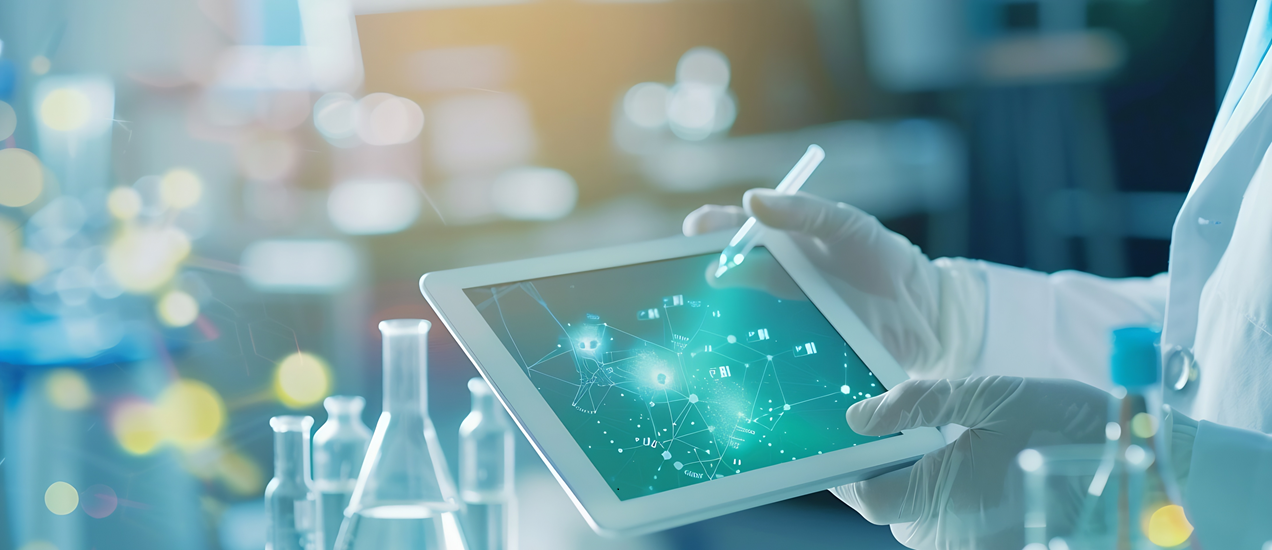 An engineer looking at medical data on his tablet