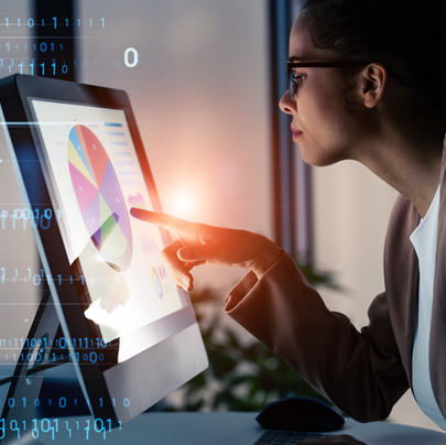 A women watching her computer.